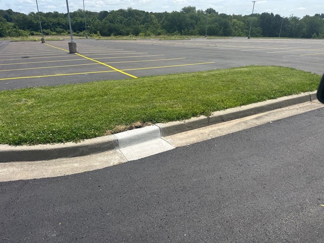 Curb Repairs at Stanley High School: Smoother Drainage, Safer Parking